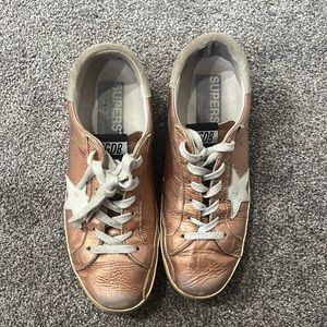 Metallic pink low-top golden goose sneakers